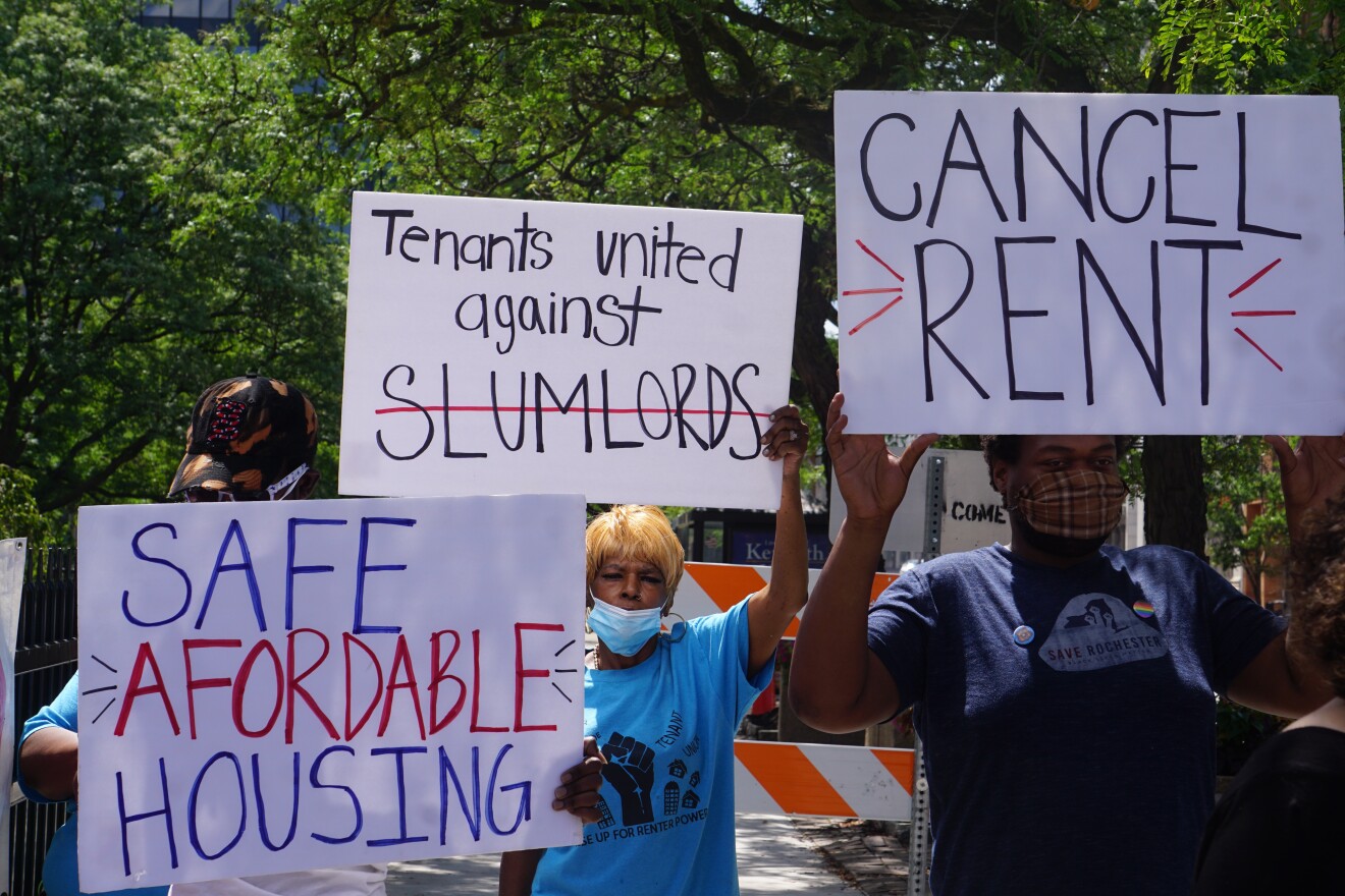Protesters for rent relief rally outside the Kenneth B. Keating Federal Building in July 2020.
